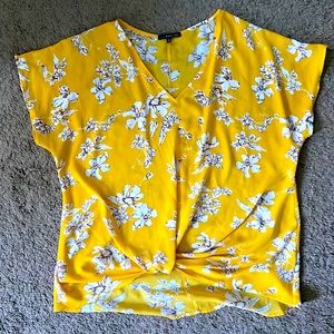 Beautiful yellow floral short sleeve blouse. Brand new.
